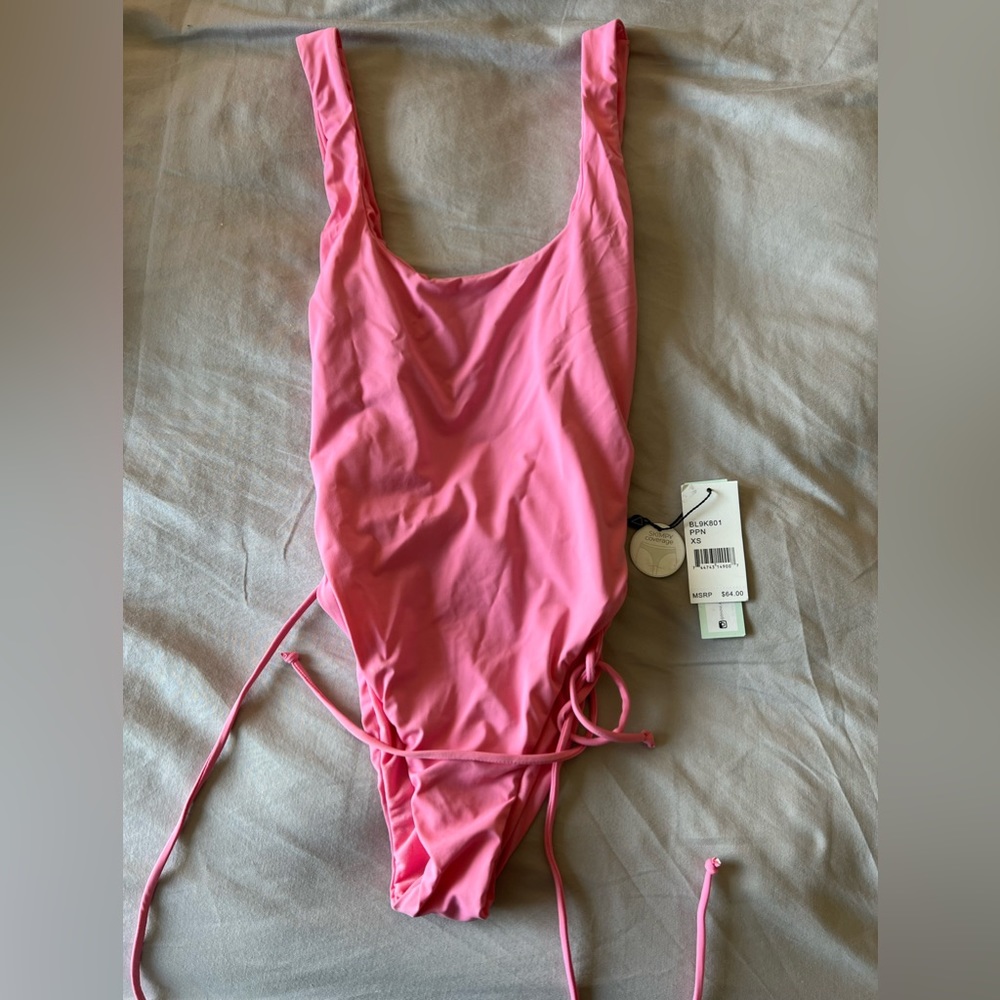 Pink swimsuit from Victoria Secret. New with tags. Never worn.